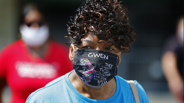 Gwen Carr, the mother of Eric Garner, wearing a face mask at a rally earlier this month.